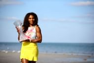 Serena Williams poses with her 2013 Miami Open title